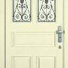Железные двери со стеклом и ковкой